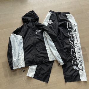 Conjunto de chaqueta cortavientos con logotipo bordado de nailon personalizado Chándales ligeros a prueba de viento de retazos - Product Image 3