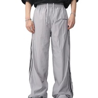 Broderie personnalisée Patch logo 100% Nylon pantalon de survêtement droit jambe large baggy pantalon de survêtement bouton pression latéral pantalon en nylon pour hommes