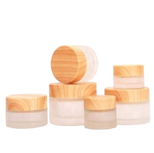 China High End <b>Clear</b> Frosted Glass Cream Jar <b>Container</b> Bamboo Cap Luxury Glass Jar With Wood Lid 30ml 50ml 100ml - Product Image 1