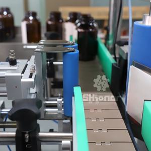 Etiqueteuse automatique à <span class=keywords><strong>cache</strong></span> haute performance multifonctionnelle pour bouteilles plates et carrées pour les applications de boissons - Product Image 6