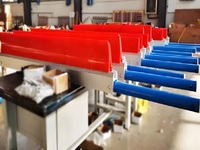 Nettoyeur de bande transporteuse primaire industriel JUXIN avec tendeur auto-ajustable et grattoir pour l'exploitation minière et le traitement des minerais