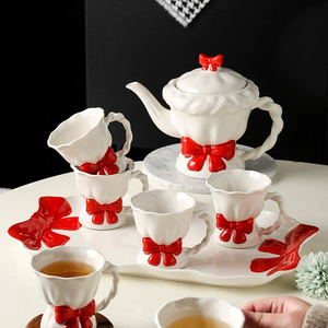 Original Modern Exquisite Bow Design Ceramic One Teapot and Four Cups Set for Best Friend Gift - Product Image 3