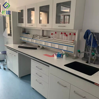 Banc de laboratoire mural sur pied avec évier et armoire suspendue, structure en acier, conception multifonctionnelle pour usage scolaire - Vente chaude