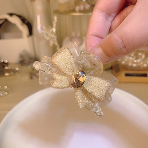 Nouveau produit, design de niche populaire, pince à cheveux élégante avec nœud papillon couleur champagne, pince à cheveux légère et luxueuse pour femmes, bijoux de mode - Product Image 3