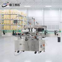 Machine d'étiquetage automatique avancée double face pour l'étiquetage des bouteilles rondes et le bordage des produits