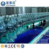 Machine automatique 3 en 1 monobloc pour le lavage, le remplissage et le bouchage de petites bouteilles d'eau minérale