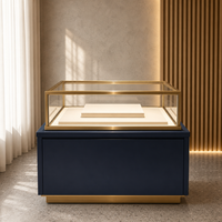 Vitrine de présentation de bijoux bleu marine personnalisée avec cadre doré pour magasin de bijoux en gros