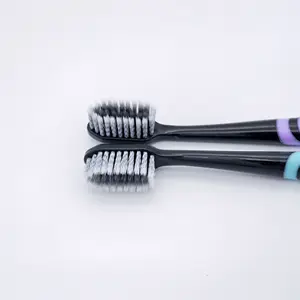 OEM/ODM 2 Color Bristle Charcoal Sprial Bristle Soft Rubber Handle Adult Toothbrush