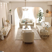 Cremefarbenes Minimalistisches Europäisches Luxus-Ledersofa-Set Massivholz Goldene Verzierung Geschwungenes Sofa-Stuhl-Set für Wohnzimmer