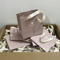 Sacs de transport et de shopping de luxe bleu clair de petite taille avec impression de votre logo personnalisé pour boutiques de parfums/bijoux