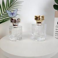 Botol Kaca Silinder Kosong Parfum Radiant 50ml/100ml Botol Semprot Kosmetik Transparan Portabel Pompa Semprot Tutup Bunga Perak