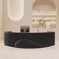 Bureau de réception gris moderne avec lumière LED, design d'usine personnalisable et durable de haute qualité pour les salons de manucure, les hôtels et les écoles.