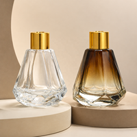 Bouteille diffuseur à roseaux en verre facetté de 60 ml, transparente, dégradé ambre, vide, pour huiles aromatiques, pour parfum d'intérieur - Vente en gros