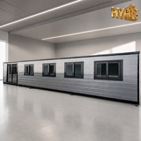 Maison conteneur moderne extensible de luxe 40 pieds, cadre noir, jaune désert, étanche et résistante au vent, idéale pour hôtel ou bureau, garantie 5 ans