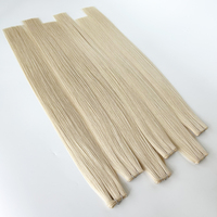 Extensiones de cabello humano de trama Genius atadas a mano con cutícula rusa intacta de rubio platino, doble dibujado