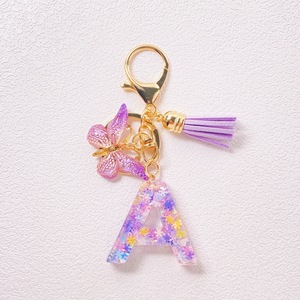 Llavero con Inicial <span class=keywords><strong>de</strong></span> Letra Morada, para Bolso, <span class=keywords><strong>de</strong></span> la A a la Z, con Borla <span class=keywords><strong>de</strong></span> Mariposa, Lentejuelas <span class=keywords><strong>de</strong></span> Resina, Letra del Alfabeto, para Mujer - Product Image 5