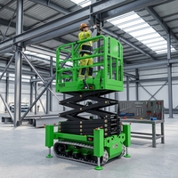Plateforme élévatrice à ciseaux sur chenilles mobiles de haute qualité 4m 6m 8m 10m 12m 14m 16m, tension de charge 110 à 220V pour la construction