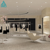 Porte-vêtements en métal style industriel pour femmes, étagère à vêtements, idéal pour les boutiques de mode urbaines – Idée de design d'intérieur