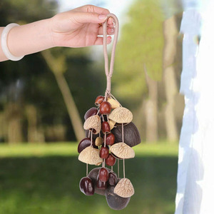 Carillon à main en coquille de graines naturelles Kenari Panji Juju Tano Chacha Salin Style Options, sonnette en coquille de noix pour bain sonore ASMR - Product Image 2