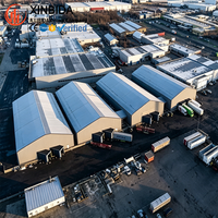 Structure de portique rigide Q355B certifiée CWB et poutre en H haute résistance pour bâtiment d'entrepôt commercial en acier destiné aux parcs logistiques