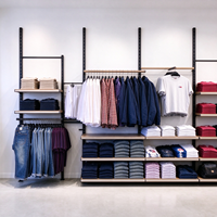 Portant à vêtements pour magasin, noir, avec poteaux à fentes, étagère en bois, rail de suspension, table de présentation ronde, CE ETL, vente en gros