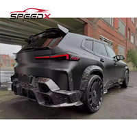 Kit carrosserie en fibre de carbone Mansory pour BMW XM : Lame avant XM, diffuseur de pare-chocs arrière, jupes latérales, élargisseurs d'ailes, spoiler