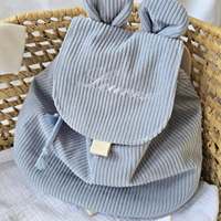 Mayorista de fábrica Mochila de PANA con Orejas de conejo para niños Mochila con cordón de un solo color lindo