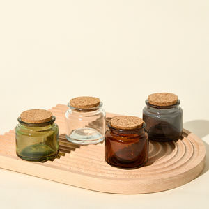 Vente en gros Petit pot à bougie en verre rond ambré <span class=keywords><strong>de</strong></span> 100ml vide avec couvercles en liège - Product Image 1