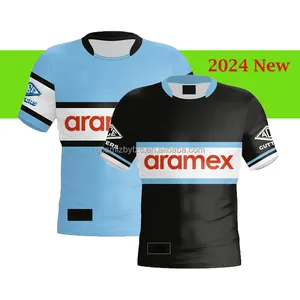 Yüksek kalite 2024 2025 yeni süblimasyon Rugby formaları NRLS Logo ile hızlı kuru % 100% Polyester köpekbalıkları Rugby futbol giyim erkekler için