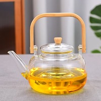 Pabrik grosir borosilikat tinggi ketel air pendingin teko teh 1000ml dengan pegangan bambu