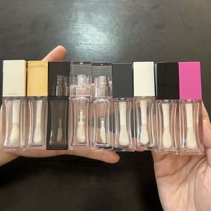 หลอดลิปกลอสทรงเหลี่ยมสีดำเงินขนาด 10 มล. พร้อมหัวแปรงขนาดใหญ่  ขวดคอนซีลเลอร์  บรรจุภัณฑ์เครื่องสำอางแบบใส  ขายส่ง  รับทำโลโก้ตามสั่ง ISMAN - Product Image 1