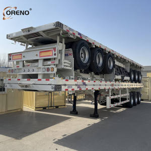 Promotion : Semi-remorque plateau 3 essieux 60 tonnes, qualité Oreno, <span class=keywords><strong>prix</strong></span> direct usine pour le <span class=keywords><strong>transport</strong></span> de conteneurs et de charges lourdes - Product Image 1
