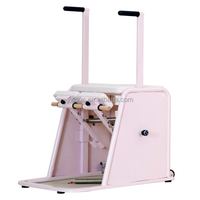 Chaise Wunda de Pilates pour la maison, la gym et le studio de yoga, avec cadre rose, poignées à résistance à ressort et pédale, pour l'entraînement d'équilibre corporel
