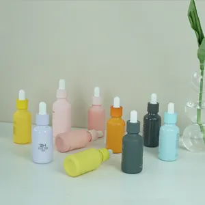 Hot sale 10ml 15ml 30ml 50ml 100ml 200ml colored white glass dropper bottles for essential oil products