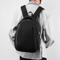 Sac à dos pour ordinateur portable en nylon élégant et de haute qualité, imperméable, résistant à l'usure, avec port de chargement USB, idéal pour les étudiants et les voyages quotidiens