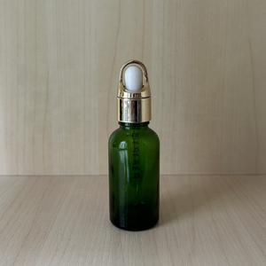 Botella <span class=keywords><strong>de</strong></span> Vidrio Verde <span class=keywords><strong>de</strong></span> <span class=keywords><strong>30</strong></span> ml con Gotero Europeo y <span class=keywords><strong>Cesta</strong></span> <span class=keywords><strong>de</strong></span> Flores, Pipeta Dorada para Aceite Facial y Sérum - Product Image 1