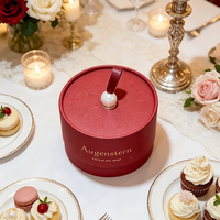 Boîtes à fleurs rondes personnalisées Augenstern, boîtes cadeaux cylindriques crème et rouge OEM ODM avec poignées en perles pour arrangements floraux
