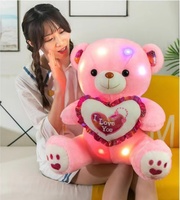Ourson en peluche Cœur Saint-Valentin en gros, jouet compagnon pour enfants avec lumière intégrée et chansons anglaises