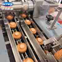 Machine automatique à haute productivité Skywinpack pour la fabrication de biscuits sandwichs à deux voies, avec ligne de conditionnement en sacs papier/plastique/feuille/aluminium/pochette