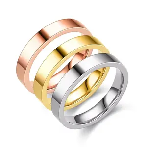 Penjualan grosir langsung pabrik cincin baja tahan karat pasangan berlapis emas 18K uniseks cincin Signet ukir