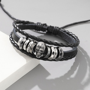 Bracelet rétro personnalisé tendance transfrontalier avec design crâne punk en métal, bracelet en cuir de vachette tressé pour homme - Product Image 1