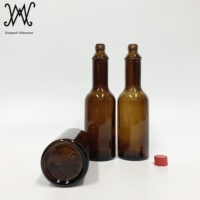 Bouteille en verre pour sauce piquante de couleur ambre de 2oz avec couvercle en plastique