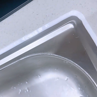 Scellant silicone acétique OEM A301 200L haute résistance, adhésif transparent pour l'aluminium, le verre, la céramique et les articles sanitaires.