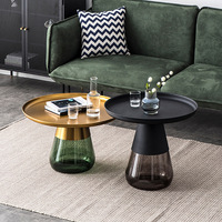 Table basse de rangement moderne avec socle en verre rond et petite table d'appoint de salon en verre