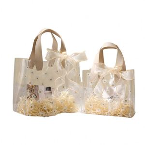 Reusable Custom Logo PVC <b>Tote</b> Bags Transparent Waterproof Clear <b>Plastic</b> Shopping Bag With Letter Pattern for Gifts - Product Image 1