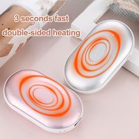 2025 Hot-Selling Hochwertiger Großhandel 2-in-1 Doppelseitige Heizung USB Wiederauf ladbarer Mini Power Bank Hand wärmer für Geschenke