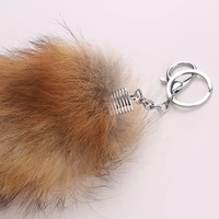 Fabricants en gros porte-clés queue de renard de couleur naturelle véritable de haute qualité pour accessoires de porte-clés de voiture affrétée