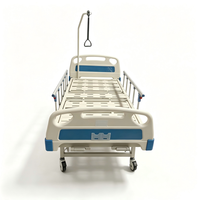 Lit d'hôpital manuel multifonctionnel avec table de lit et barre de maintien pour patients orthopédiques