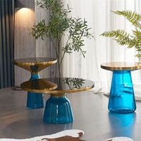 Table basse de salon moderne de style nordique de luxe avec base en verre et finition en acier inoxydable plaqué or champagne