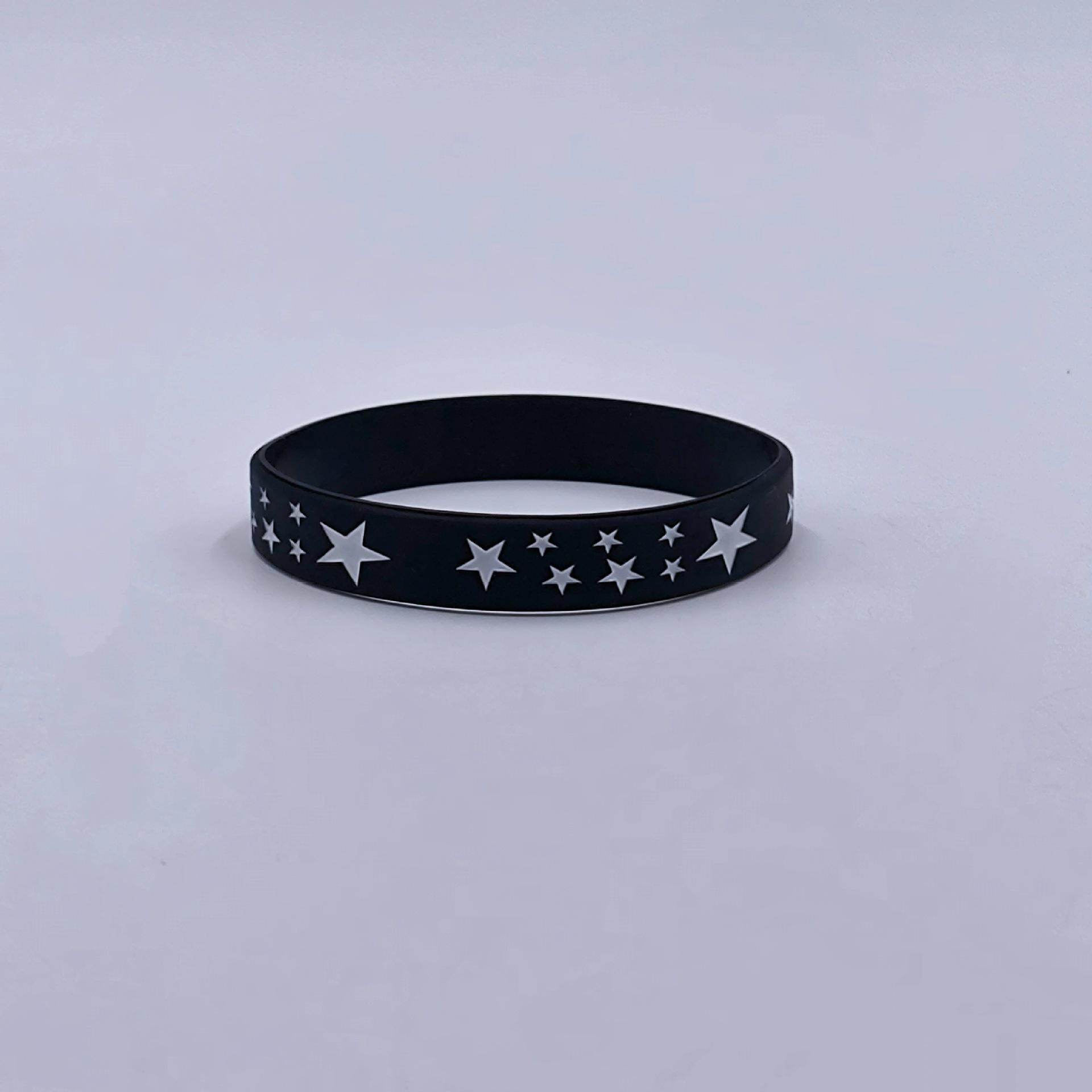 Black silicone bracelet with white accents